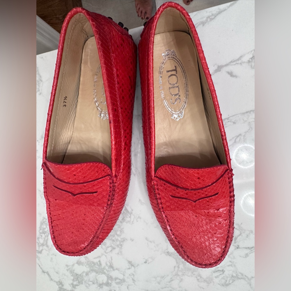 Authentic Tod’s Loafers! Red size 37 1/2. Worn very little. In great shape!
